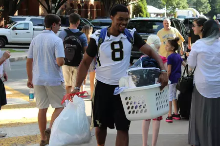 Quarterback Kevin Sousa has his hands full.