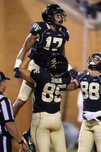 Cam Serigne and E.J. Scott combined for 12 catches, 153 yards and a TD.