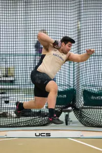 John Maurins set a PR in the shot put on Saturday