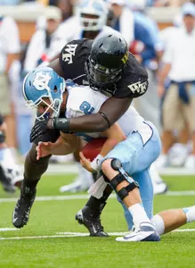 Tylor Harris earns a sack in the 2012 meeting between Wake Forest and UNC.