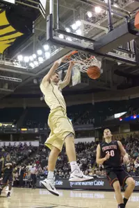 Konstantinos Mitoglou came off the bench to lead the Deacons with 15 points against Princeton.