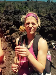 Katie Dry roasts a marshmallow in a lava pocket.