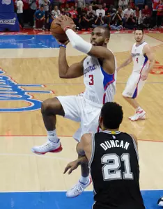 Chris Paul of the Clippers shoots over Tim Duncan of the Spurs in game seven.