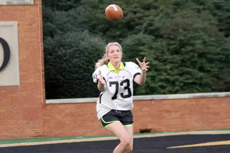 Participants will be put through football drills on the turf at BB&T Field.