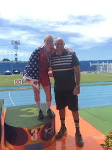 Jessie Merckle pictured with Wake Forest assistant coach Zeb Sion after wrapping up her career with a bronze medal in the javelin at the NACAC U23 Championships.