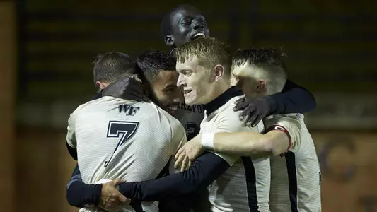 The Deacs celebrate Bruno Lapa's game-winning goal.