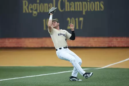 Michael Ludowig hauls in a fly ball during an 18-12 win over Virginia at David F. Couch Ballpark on Saturday afternoon (Brian Westerholt/Four Seam Images)