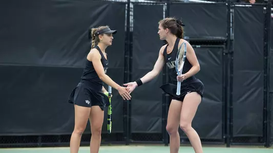 Eliza Omirou; Mary Caroline Meredith