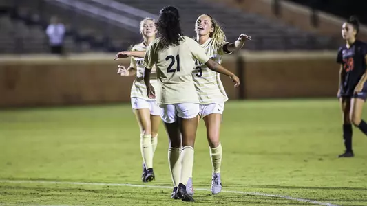 Ryanne Brown and Giovanna DeMarco celebrate a goal