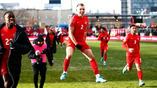 TORONTO, ON - MARCH 27: Alistair Johnston #2 of Canada celebrates after the final whistle following a 2022 World Cup Qualifying match against Jamaica at BMO Field on March 27, 2022 in Toronto, Ontario, Canada. (Photo by Vaughn Ridley/Getty Images)