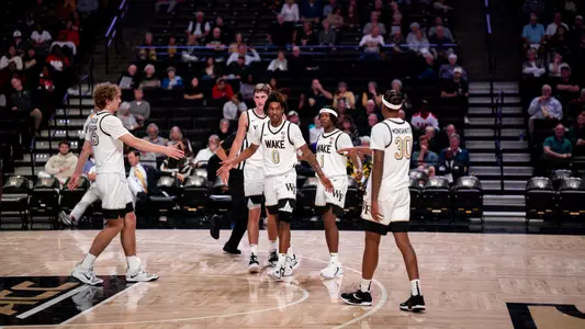 mbb team high fives