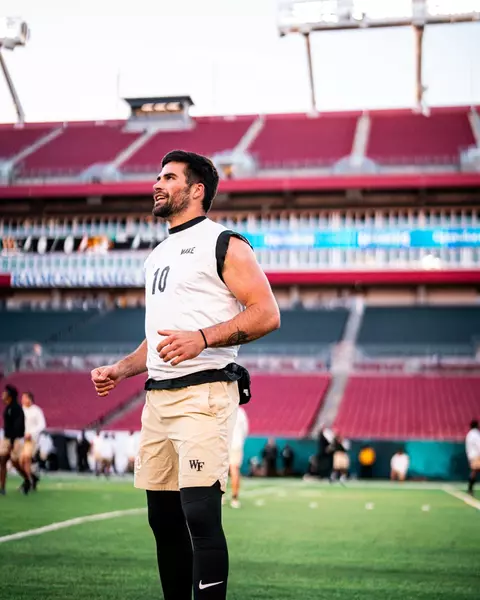 Photo of Sam Hartman warming up for the Gasparilla Bowl