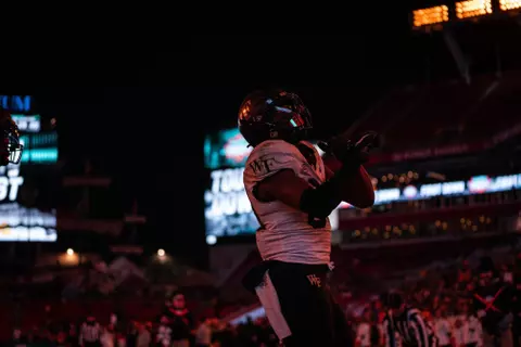 Jahmal Banks celebrating in the endzone with his arms crossed