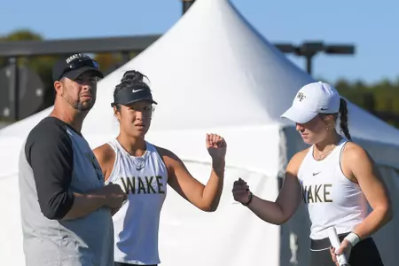 Stella Li and Whitley Pate with Coach Andy Roland