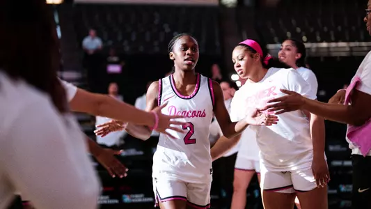 Kaia Harrison and Alex Scruggs during pregame introductions