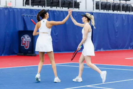 Women’s Tennis takes on Wake Forest in the Liberty Indoor Tennis Center on January 24, 2025. (Photo by KJ Jugar)