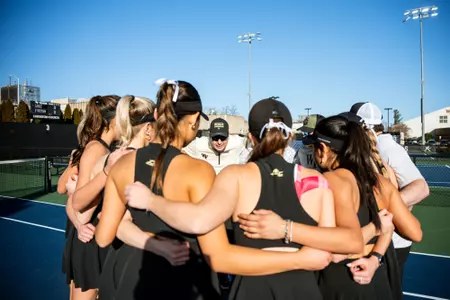Women's tennis huddle