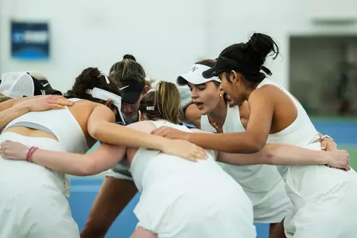 Women's Tennis huddle