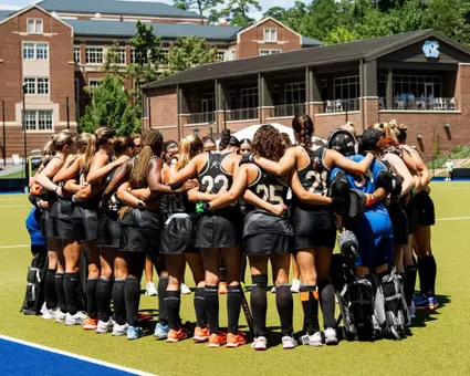 26 Field Hockey huddle