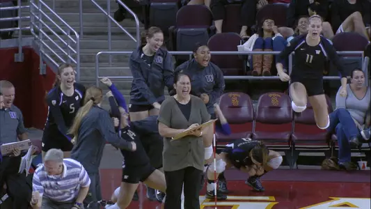 women's volleyball celebrates after win over USC in LA