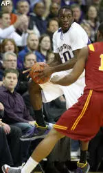 Dentmon Lifts Huskies Over Trojans, 78-73
