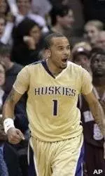 Washington Holds Off Upset-Minded Montana