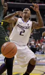 Defense - A Zone! -- Sends Huskies Past Oregon 69-51, Into Pac-10 Finals vs. Arizona