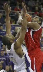 Huskies Dominate Cougars, 110-63