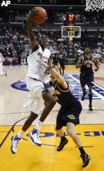 Bears Rally To Nip Huskies, 84-81