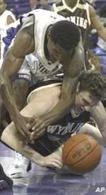 Romar Gets First Win As Huskies' Head Coach