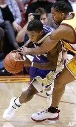 Huskies Hang On To Beat Trojans