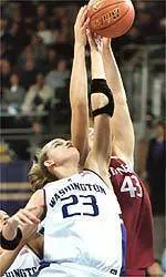 'Cats Outlast Husky Women in Pac-10 Opener