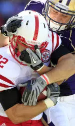 Huskies Hit Wall In Vaunted Huskers' Defense, 56-21