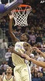 Huskies Solve Trojans, 76-72