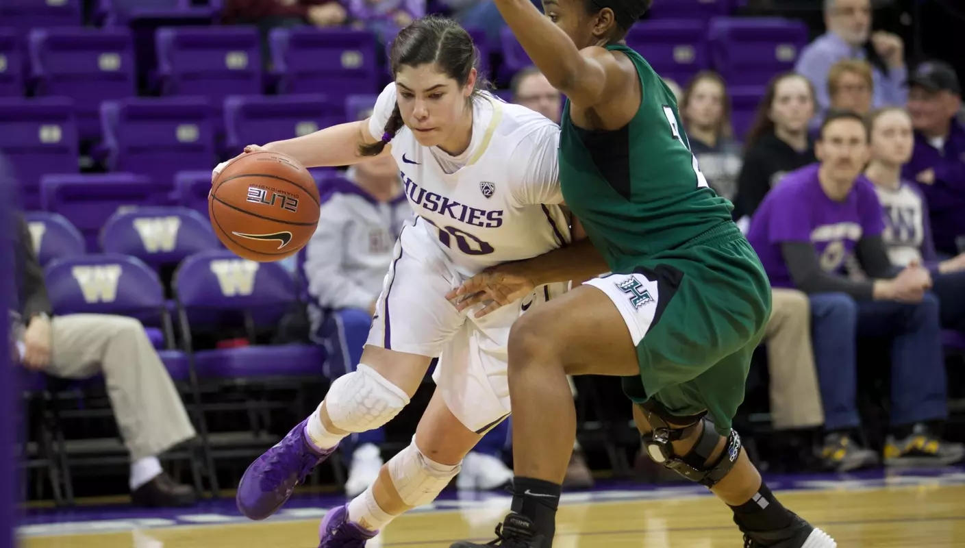 Plum Nets Husky Record 45 Points, But UW Falls