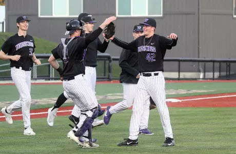 Willie MacIver and Cole Galvagno celebrate a win in the Purple and Gold World Series.