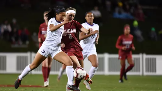 Kaylene Pang fights an attacker off the ball