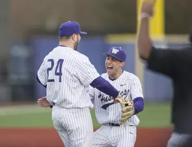 Joe DeMers is greeted by AJ Graffanino after DeMers throws a not hitter.
