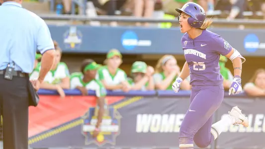 Kirstyn Thomas comes home to score a run