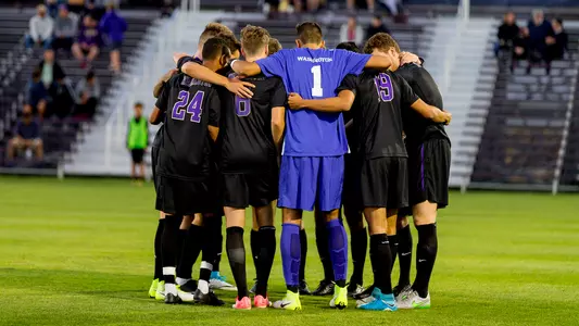 Men's Soccer Team Huddle
