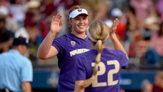 Gabbie Plain high fives Sis Bates