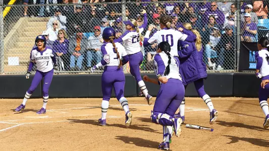 The team celebrates at home