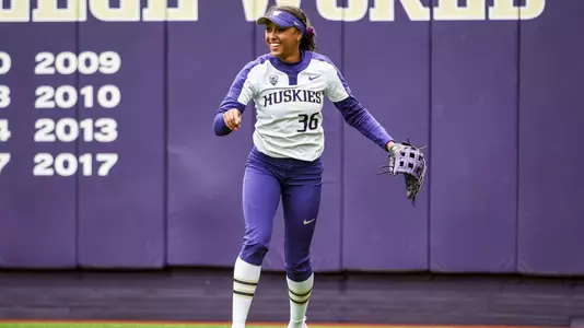 Amirah Milloy celebrates in the outfield