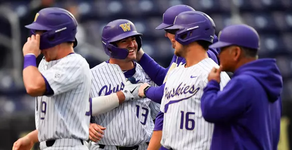Colton Cassinelli is congratulated after his first career hit drives in two runs. Photo by Alika Jenner