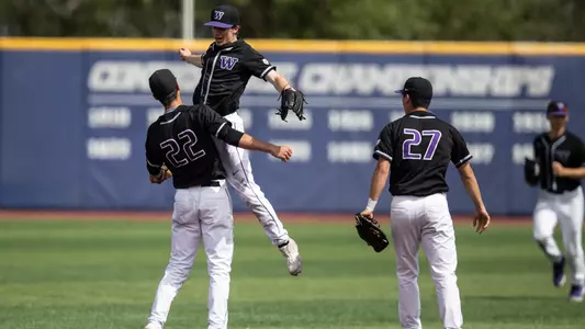 Braiden Ward celebrates with Ben Baird after throwing out the final out of the game.