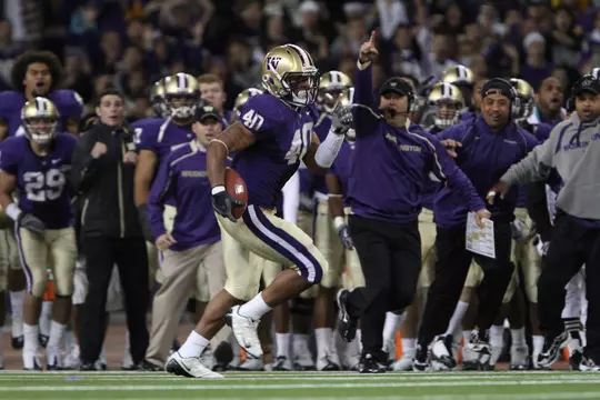 2009 University of Washington football vs. Arizona at Husky Stadium. Mason Foster returns interception for game-winning touchdown