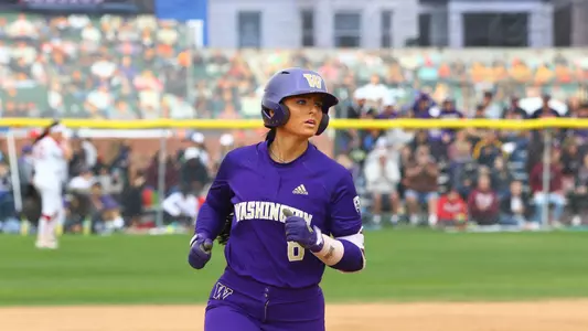 Baylee Klingler rounds third