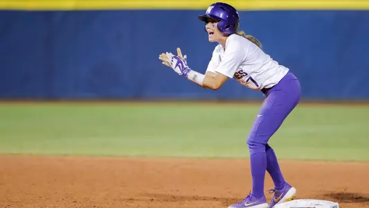 Taryn Atlee claps after reaching second