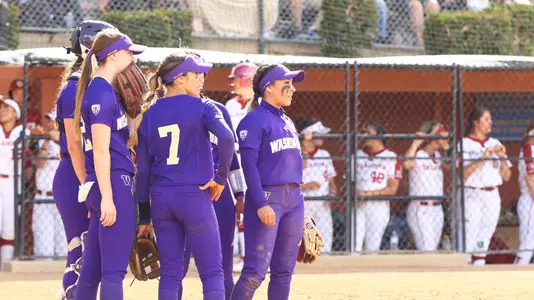 The team waits to take the infield