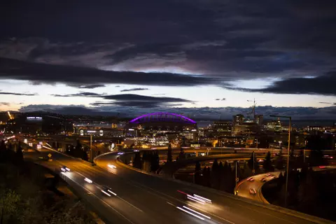 CenturyLink Field lit purple at night for the Togetheruw campaign